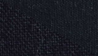 Fabric swatch dyed in black, demonstrating the color achieved with our dye on different fabrics